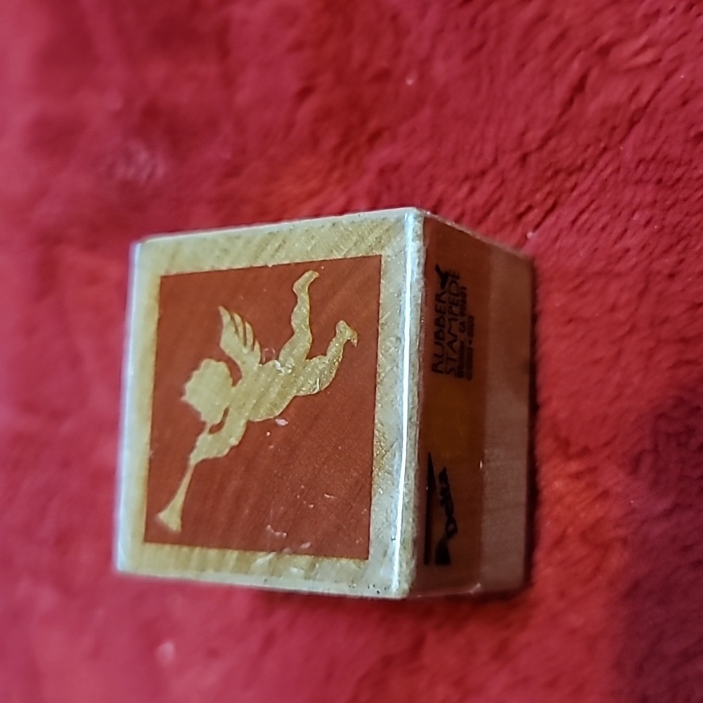 Cherub Blowing Horn Rubber stamp by Stampede.